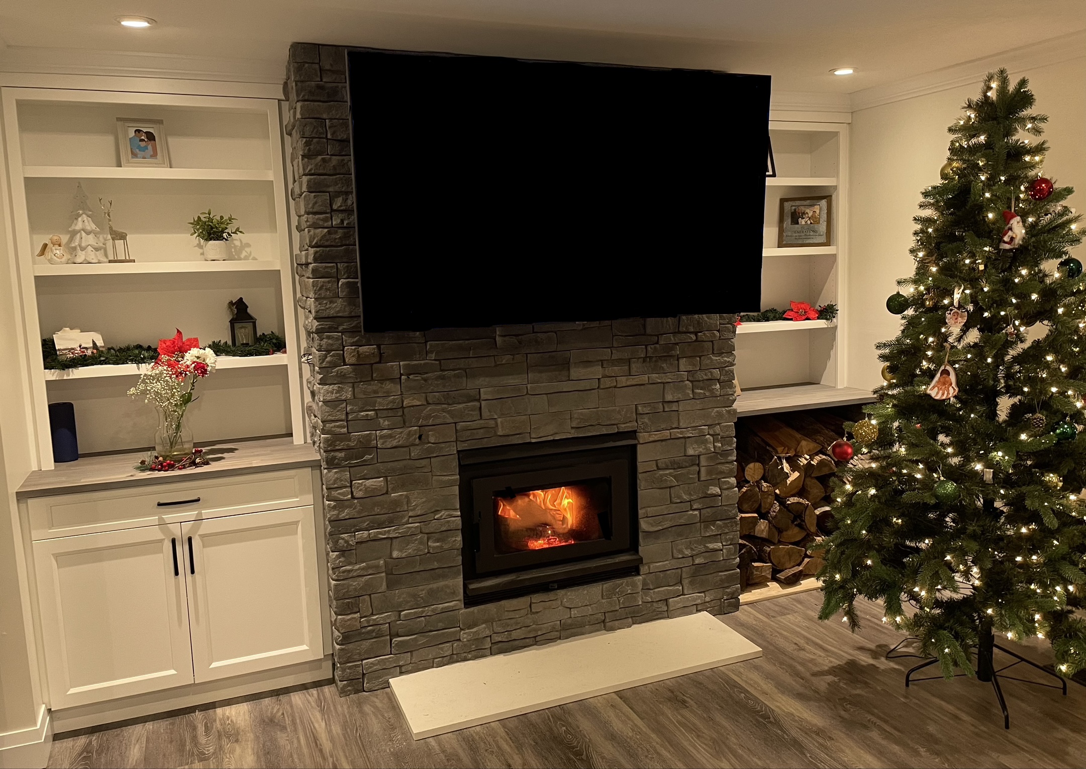 Fireplace after full kitchen renovation with custom cabinetry by SSP Cabinetry